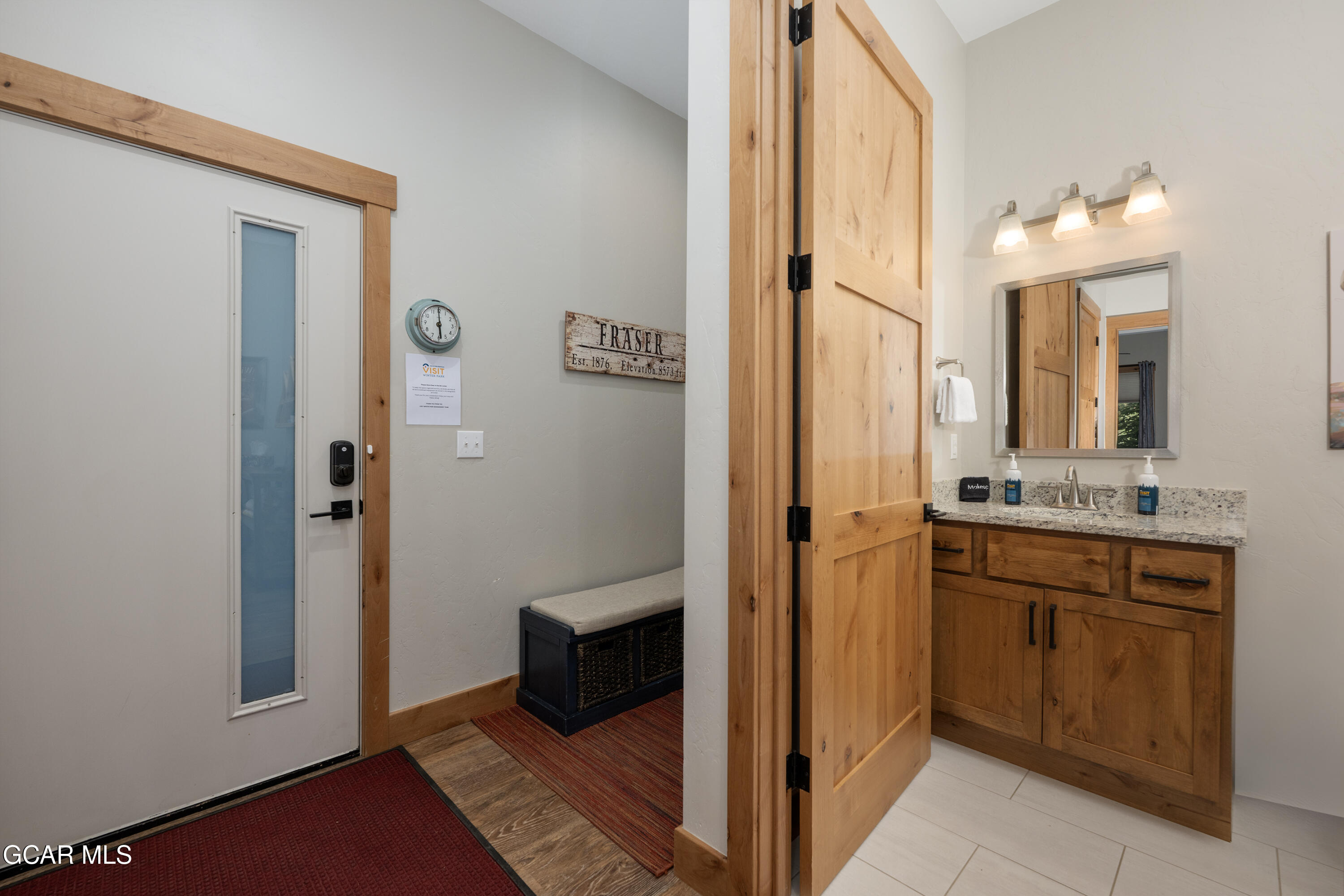 40 Springview Lane Fraser, CO 80442 - Photo 14 of 36 a spacious bathroom with a shower and a sink