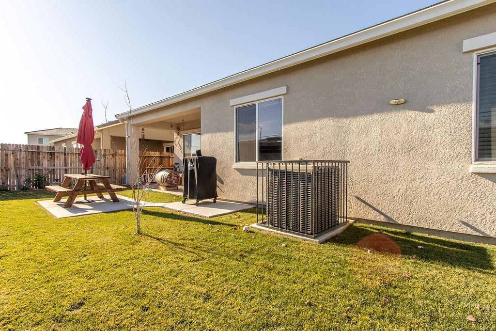 2354 Ruthie Place Manteca, CA 95337 - Photo 15 of 22 a view of a house with swimming pool and sitting area