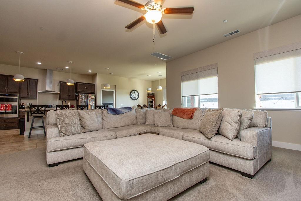 2354 Ruthie Place Manteca, CA 95337 - Photo 3 of 22 a living room with furniture and a large window