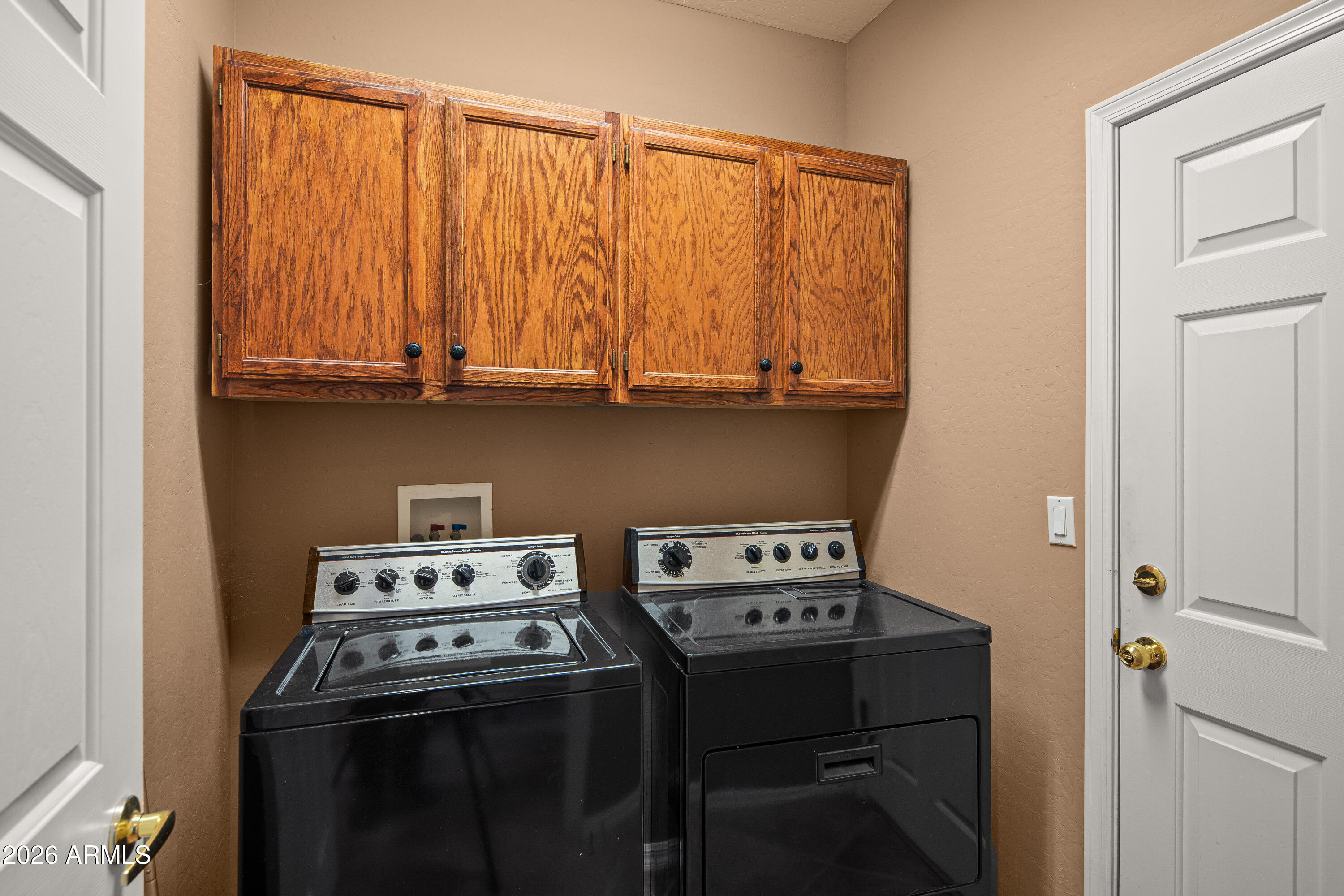 1070 Crown Ridge Road Sedona, AZ 86351 - Photo 11 of 28 a kitchen with a stove and a microwave