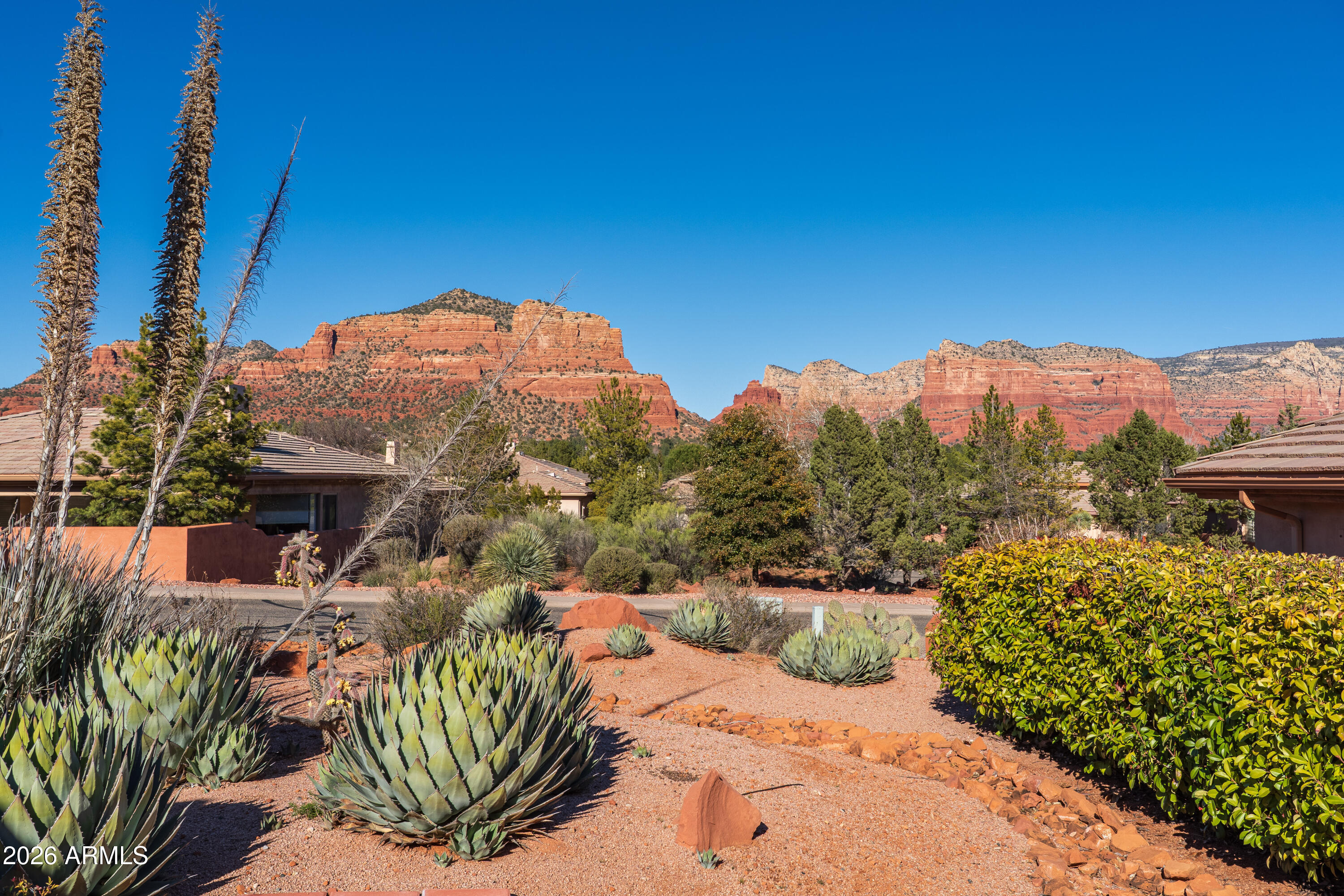1070 Crown Ridge Road Sedona, AZ 86351 - Photo 23 of 28 a view of a terrace with a garden