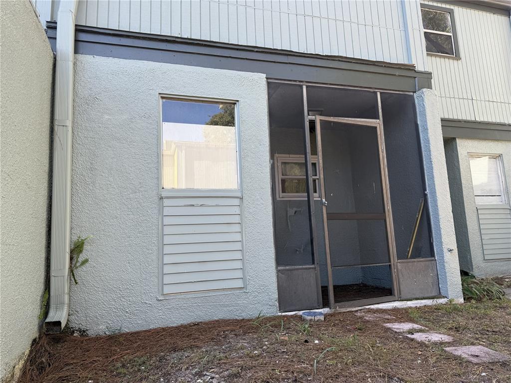 709 Southwest 75th Street, Unit 104 Gainesville, FL 32607 - Photo 1 of 34 a view of entryway door