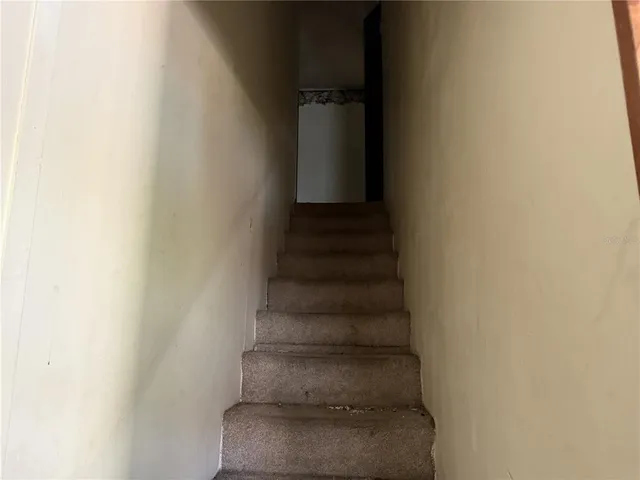 a view of a room with rack on the wall