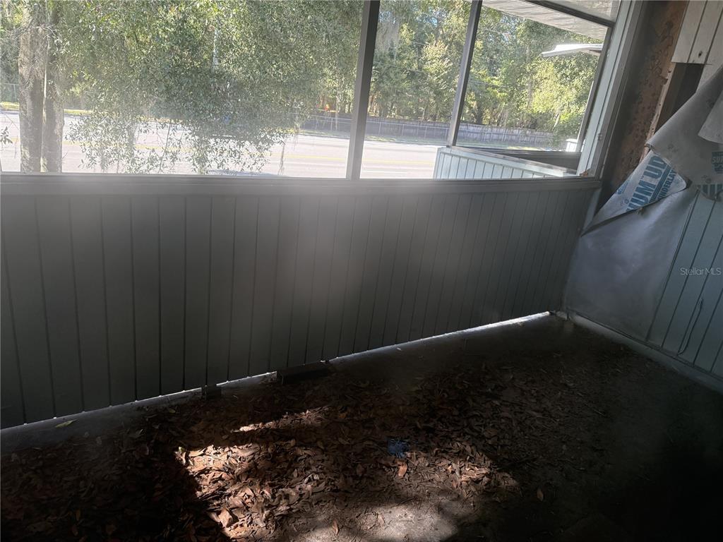 709 Southwest 75th Street, Unit 104 Gainesville, FL 32607 - Photo 27 of 34 a view of a small space with window and outside view