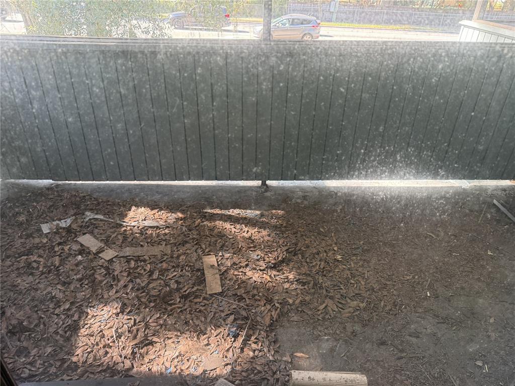 709 Southwest 75th Street, Unit 104 Gainesville, FL 32607 - Photo 30 of 34 a view of a backyard