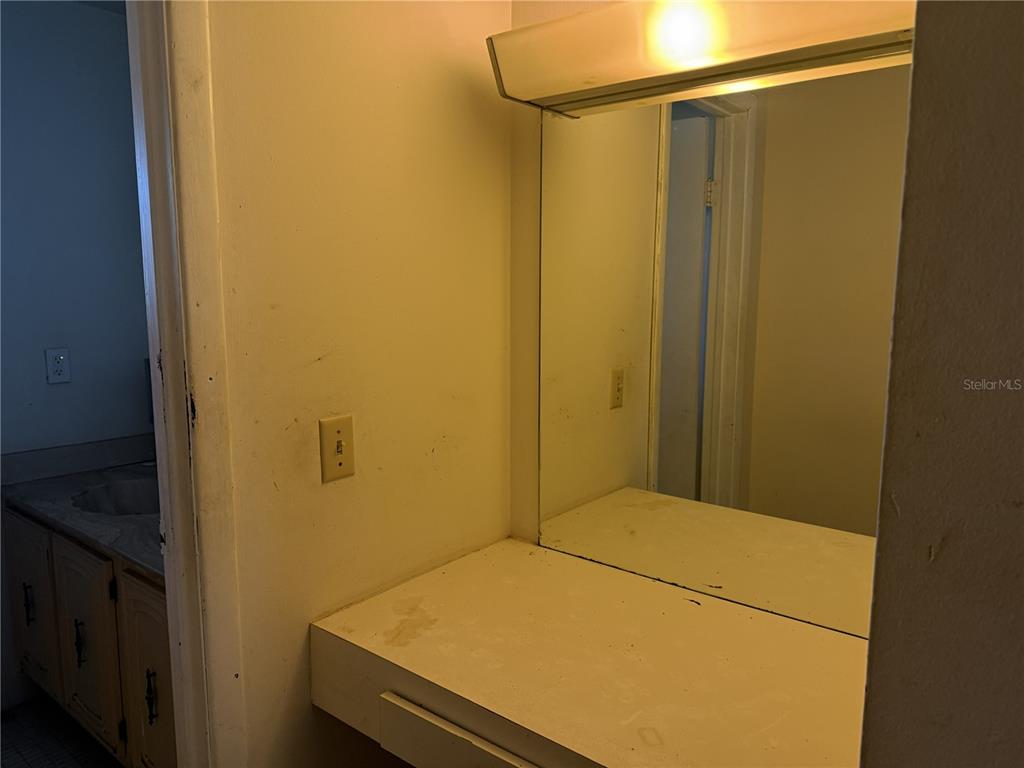 709 Southwest 75th Street, Unit 104 Gainesville, FL 32607 - Photo 32 of 34 a bathroom with a shower and a sink