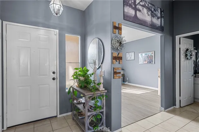 a room with furniture a bed and a window