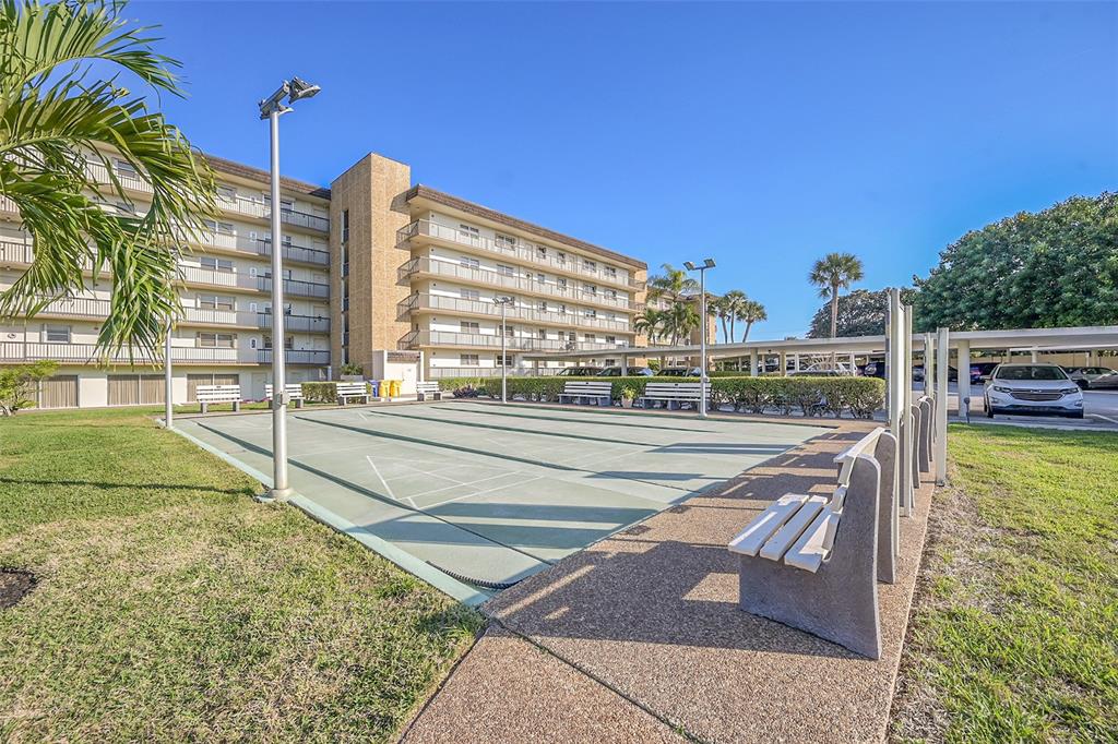 555 Northwest 4th Avenue, Unit 4190 Boca Raton, FL 33432 - Photo 18 of 18 a view of balcony with a floor to ceiling window and wooden fence