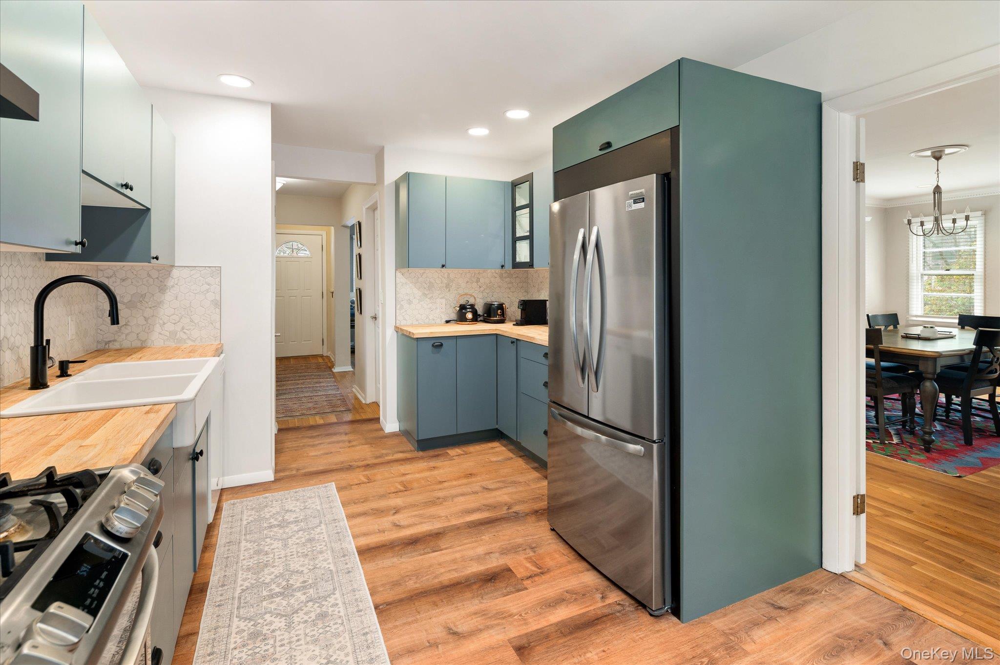 4 Pine Ridge Road Rye Brook, NY 10573 - Photo 13 of 41 Kitchen (to dining room on right, to foyer/hallway on left)