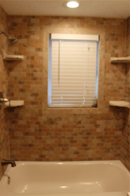 6812 Roosevelt Drive Port Richey, FL 34668 - Photo 7 of 11 a view of a bathroom