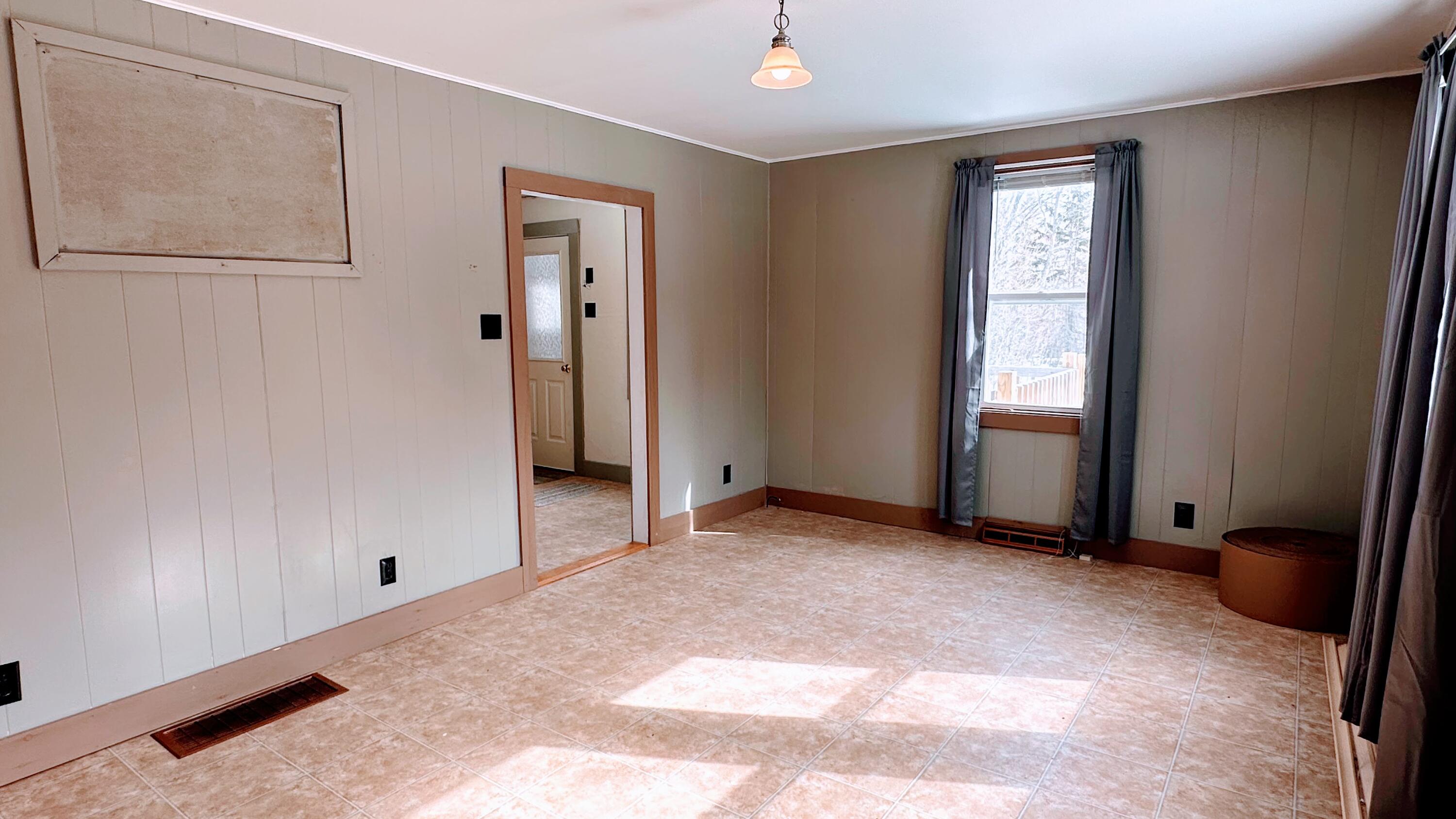 345 Court Street Machias, ME 04654 - Photo 19 of 52 Living Room Corner with View to Kitchen