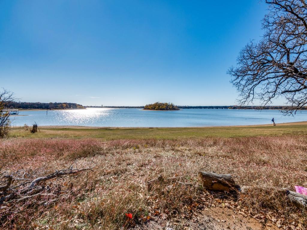 25 Live Oak Lane Hickory Creek, TX 75065 - Photo 1 of 5 a view of an ocean and beach