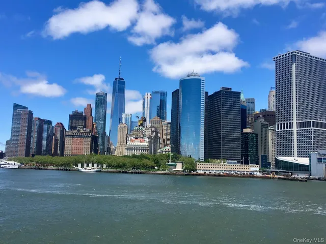 a view of a city with tall buildings