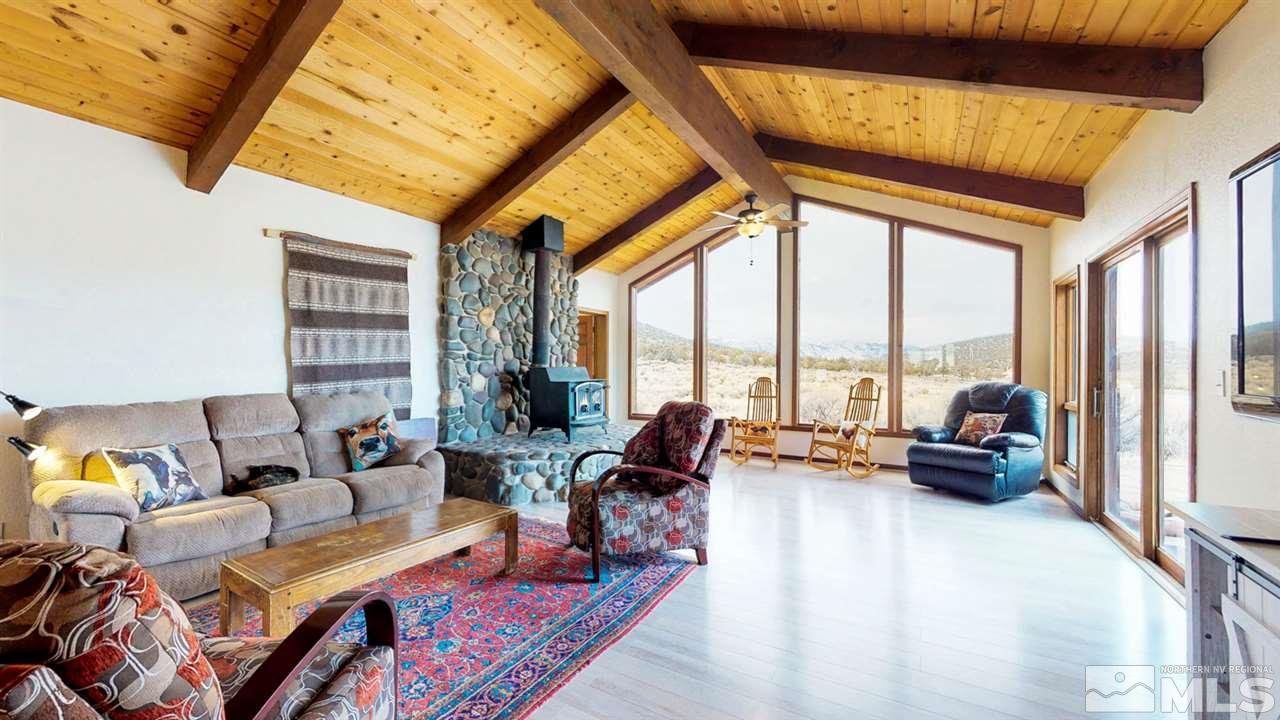 3000 Pinenut Road Gardnerville, NV 89410 - Photo 4 of 20 a living room with furniture and floor to ceiling windows