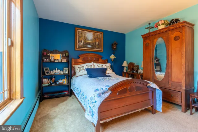 a view of a hallway with wooden shelves