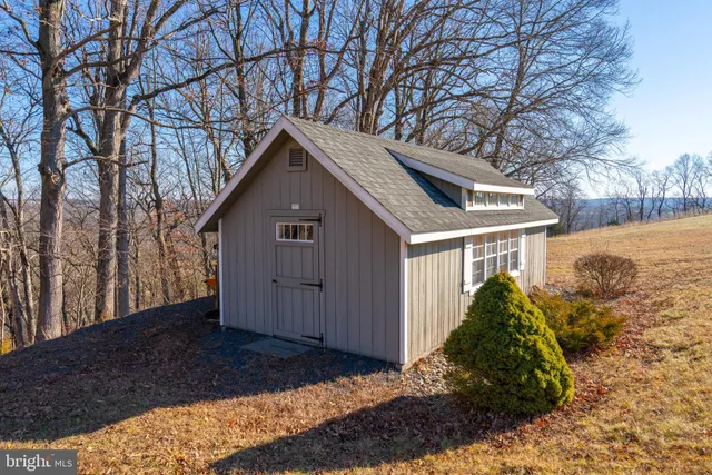 a fire hydrant in the middle of a field