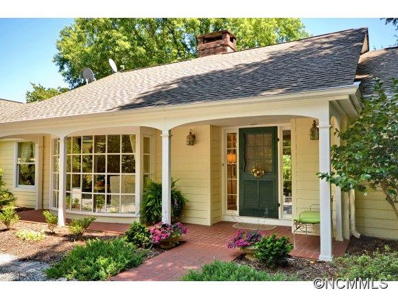 1001 Golden Road Tryon, NC 28782 - Photo 1 of 18 a front view of a house with a porch