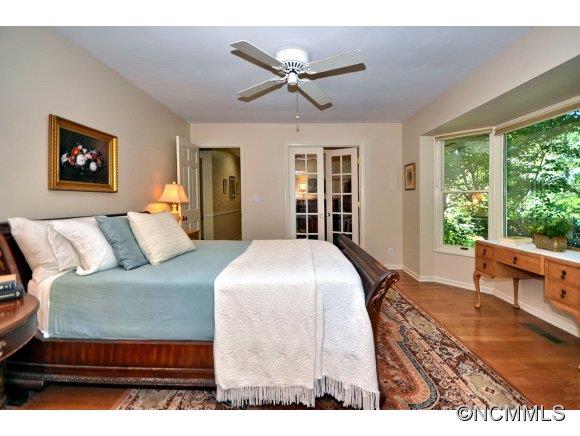 1001 Golden Road Tryon, NC 28782 - Photo 11 of 18 a bedroom with a large bed and a window