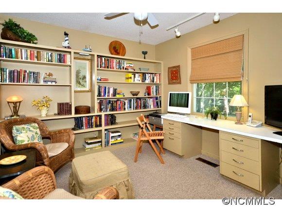 1001 Golden Road Tryon, NC 28782 - Photo 14 of 18 a living room with furniture a rug and a window