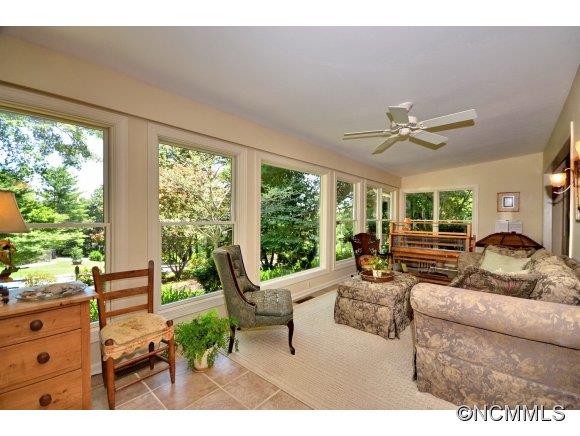 1001 Golden Road Tryon, NC 28782 - Photo 9 of 18 a living room with furniture and a large window