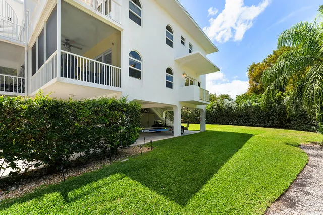a view of a back yard of the house
