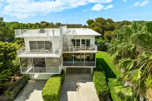 a view of a house with a garden