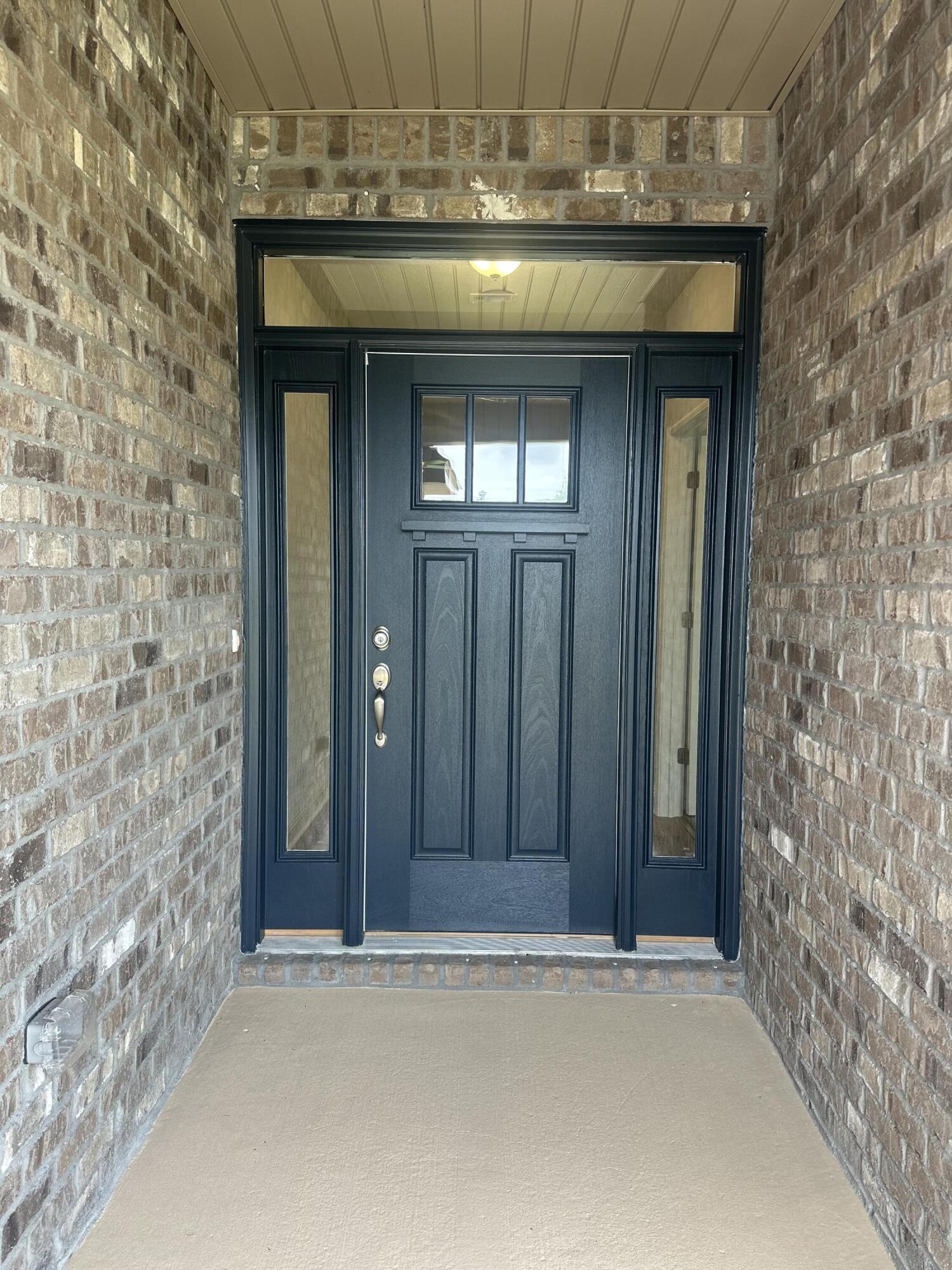 191 Ridgeway Circle Crestview, FL 32536 - Photo 2 of 26 a view of wooden door