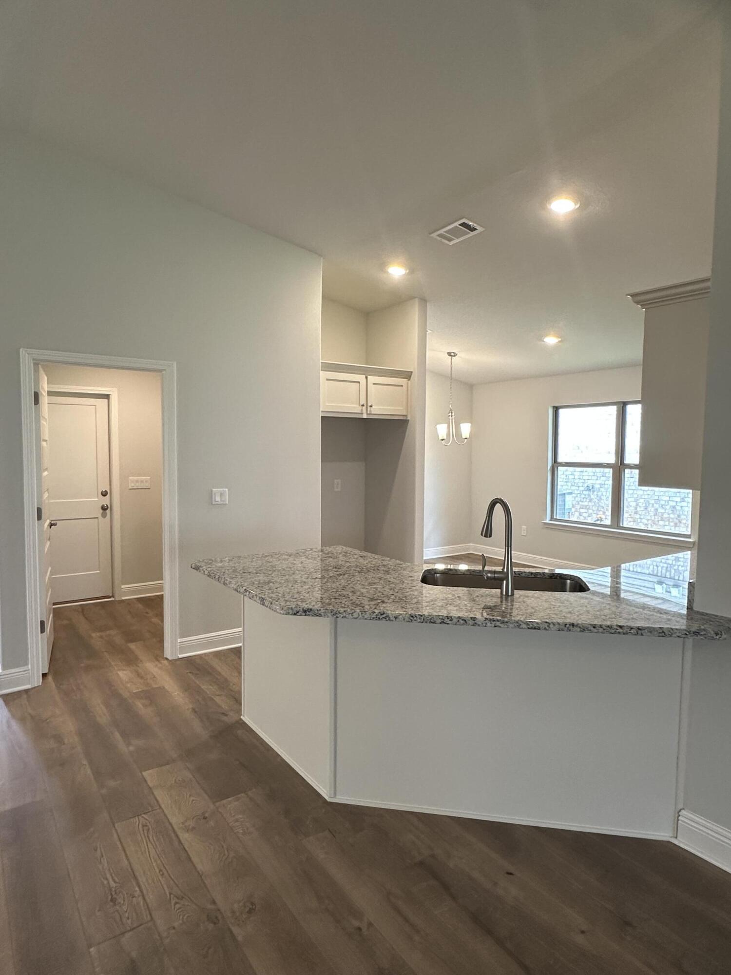 191 Ridgeway Circle Crestview, FL 32536 - Photo 7 of 26 a view of a kitchen counter top space sink and refrigerator