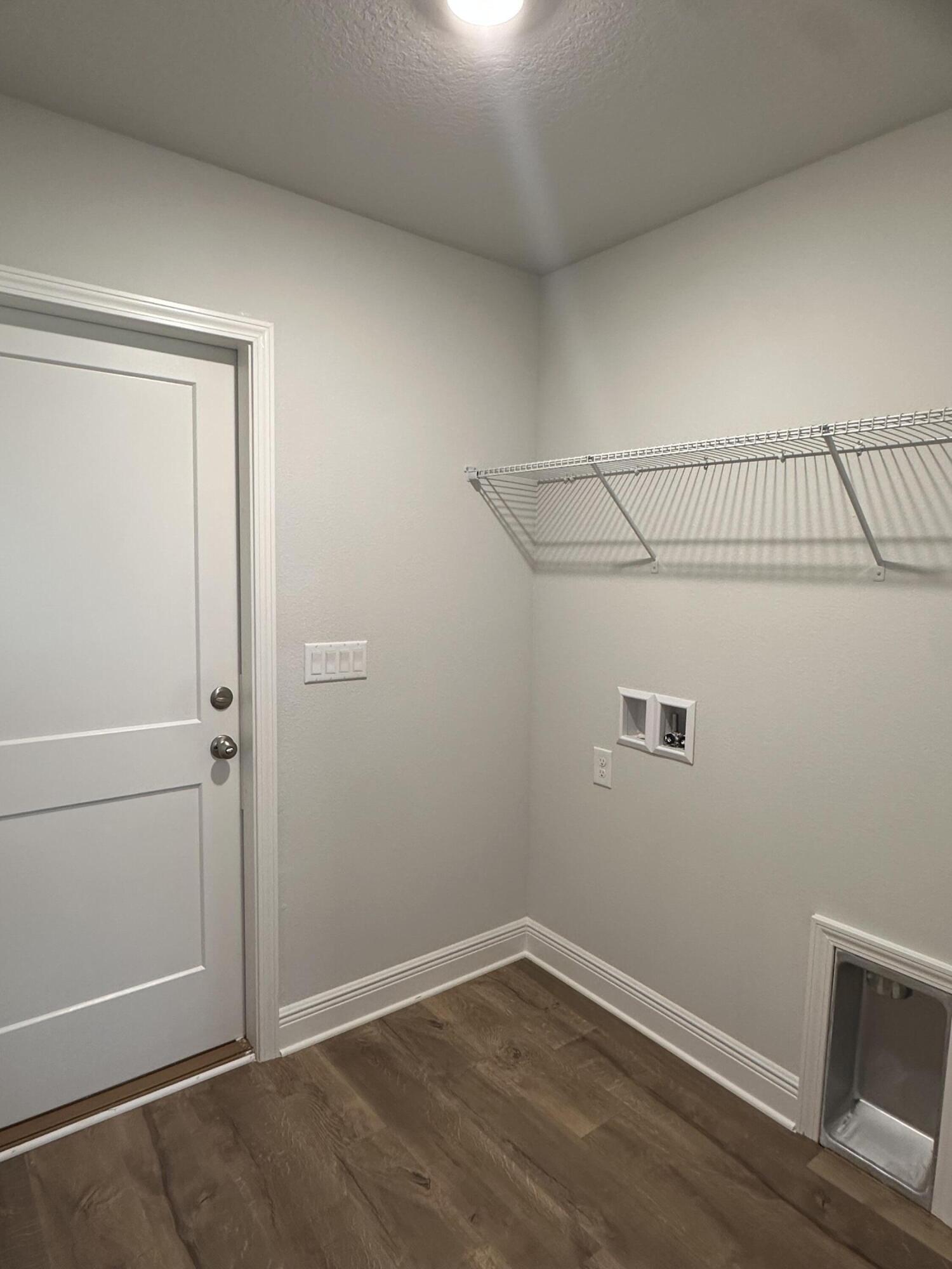 191 Ridgeway Circle Crestview, FL 32536 - Photo 9 of 26 a view of a room with wooden floor