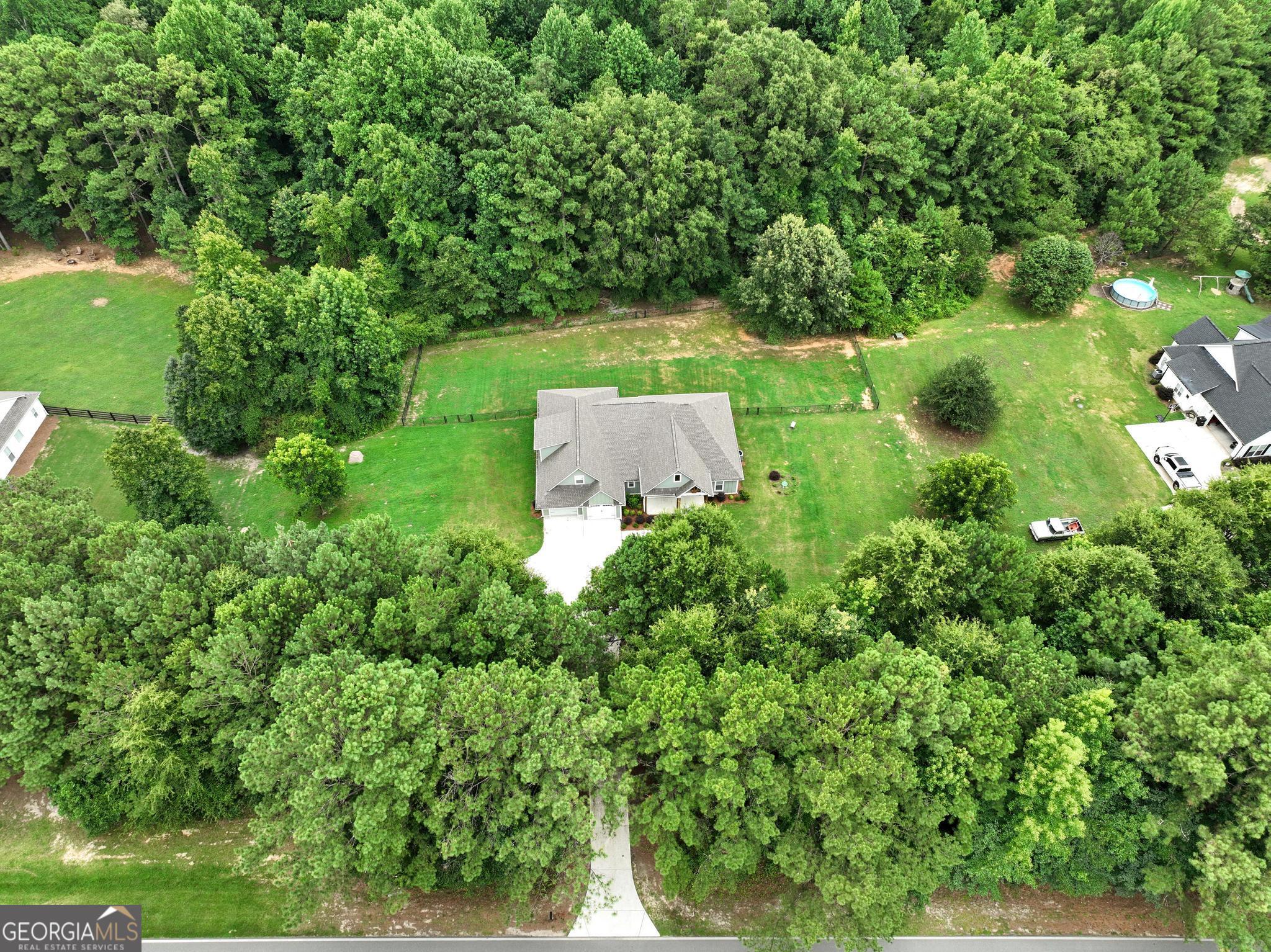 1355 Rose Hill Road Meansville, GA 30256 - Photo 3 of 52