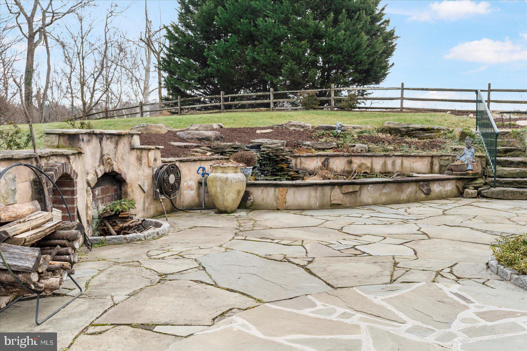 14411 Falls Road Cockeysville, MD 21030 - Photo 16 of 89 Stone Patio with Outdoor Firepit