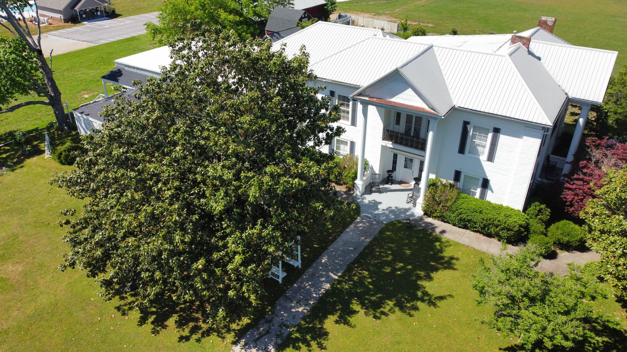 974 Lynchburg Road Winchester, TN 37398 - Photo 46 of 51 a aerial view of a house with a yard and potted plants