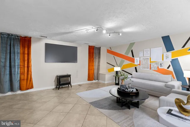 a view of a wooden deck with trees