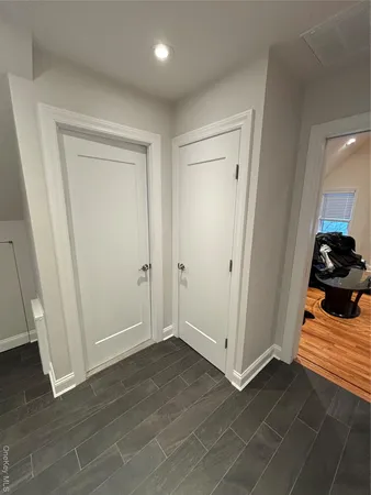 a view of a livingroom with wooden floor