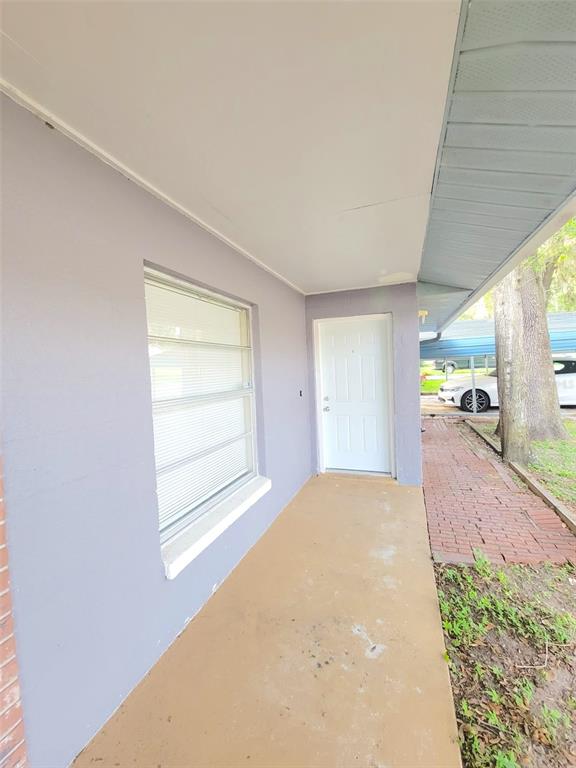 5338 Orange Avenue, Unit B Seffner, FL 33584 - Photo 2 of 8 a view of a room that has a window