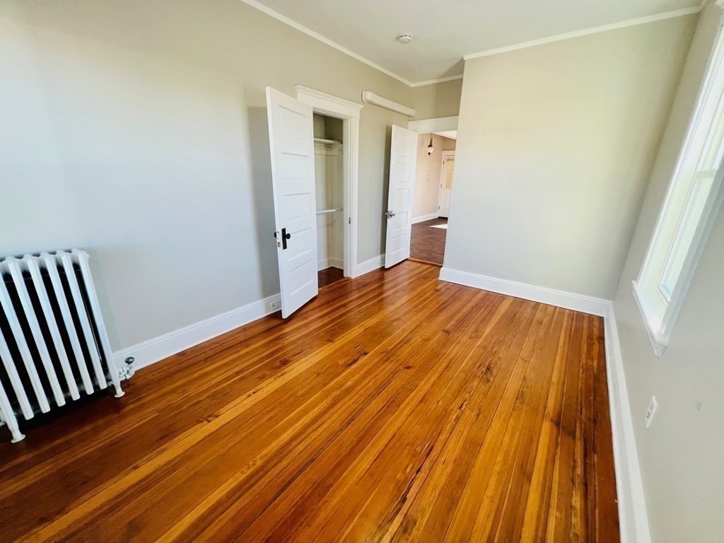 22 Gardena Street, Unit 3 Boston, MA 02135 - Photo 12 of 17 a view of wooden floor