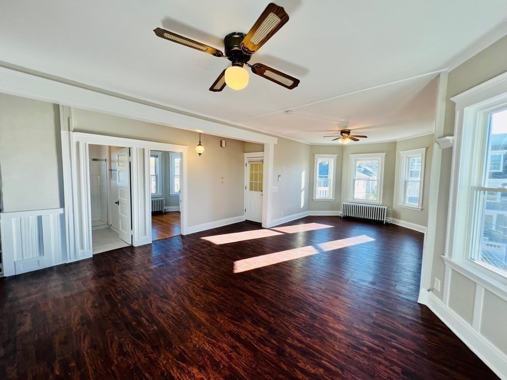 22 Gardena Street, Unit 3 Boston, MA 02135 - Photo 3 of 17 a view of empty room with wooden floor