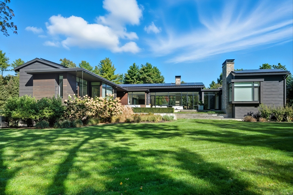63 Sylvan Lane Weston, MA 02493 - Photo 4 of 28 a front view of house with a garden