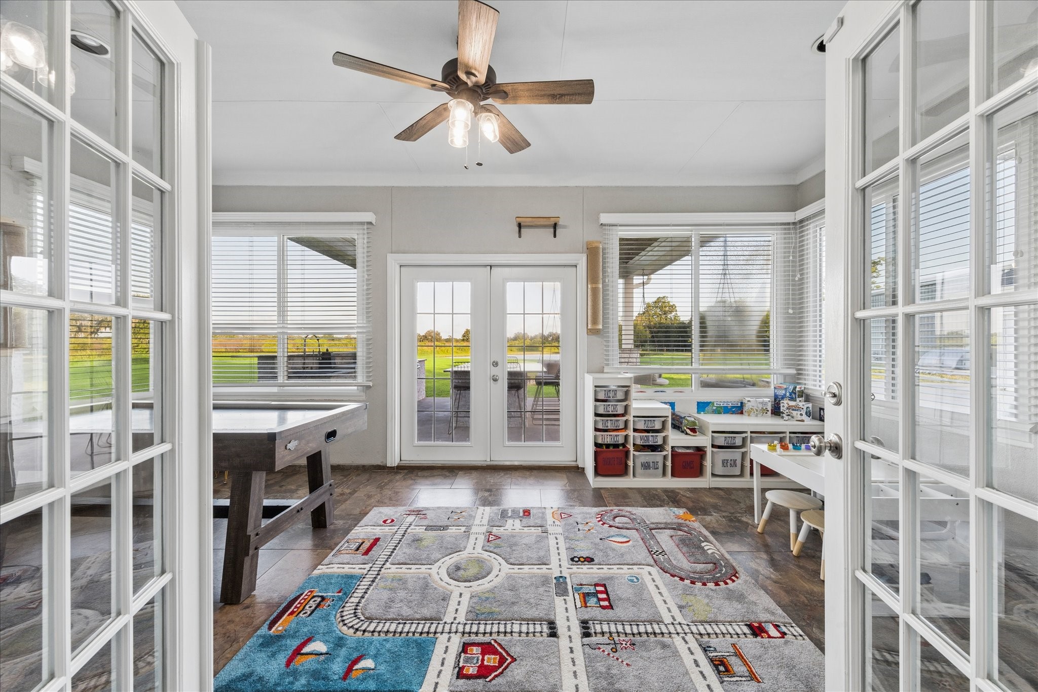 2702 Horseshoe Lane Rosharon, TX 77583 - Photo 27 of 43 Sunroom offers year-round enjoyment with abundant natural light and supplemental mini-split climate control.