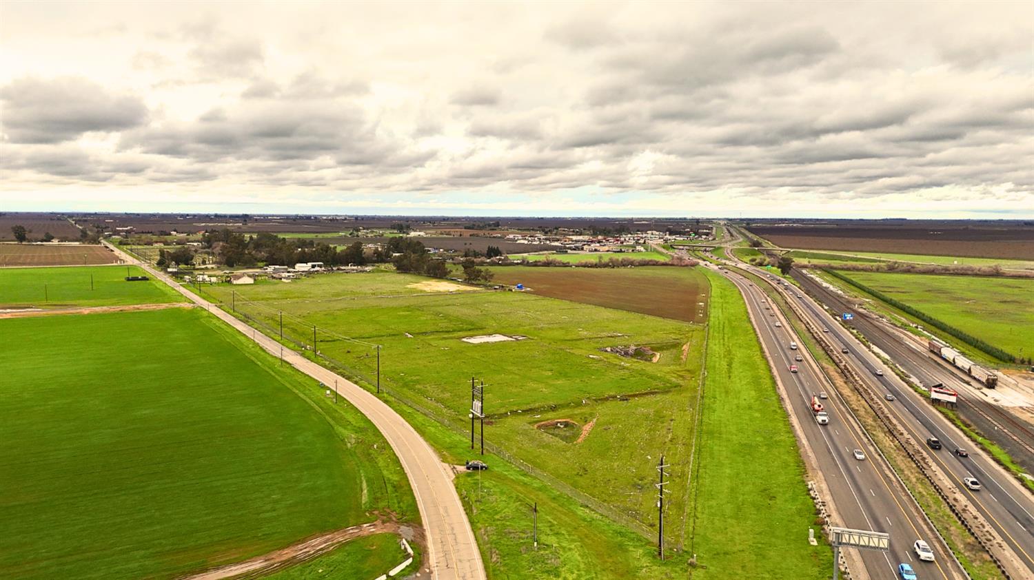 23431 Ave 18 Madera, CA 93637 - Photo 3 of 3 a view of an outdoor space and a swimming pool