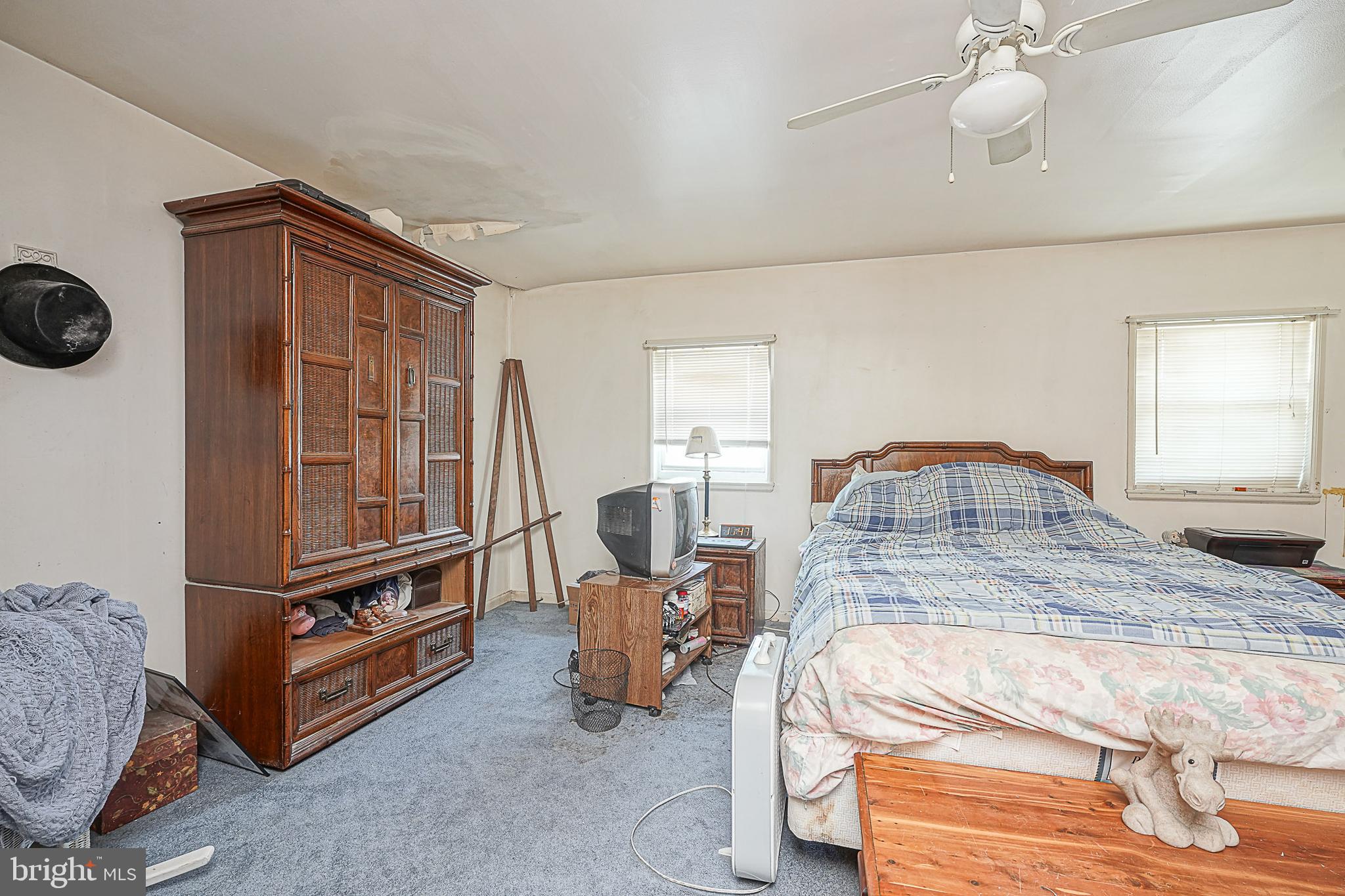 12645 Medford Road Philadelphia, PA 19154 - Photo 16 of 27 a bedroom with bed and window