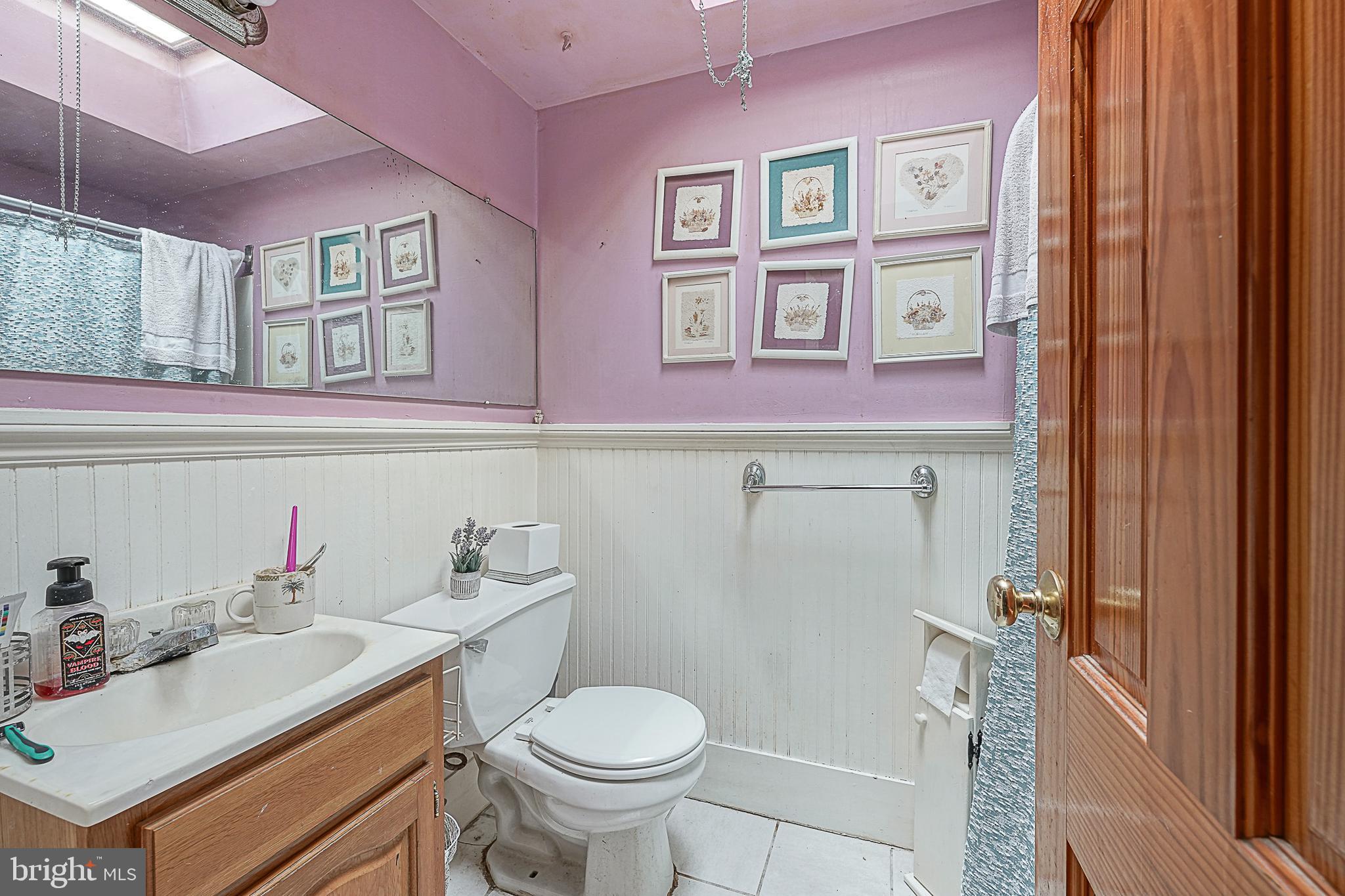 12645 Medford Road Philadelphia, PA 19154 - Photo 19 of 27 a bathroom with a sink toilet and vanity
