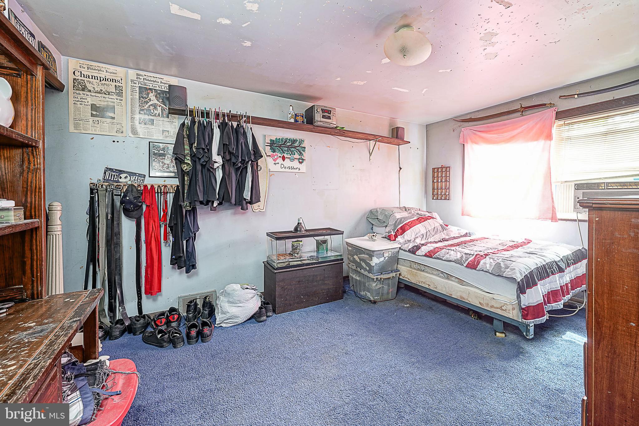 12645 Medford Road Philadelphia, PA 19154 - Photo 22 of 27 a bedroom with a bed and a window