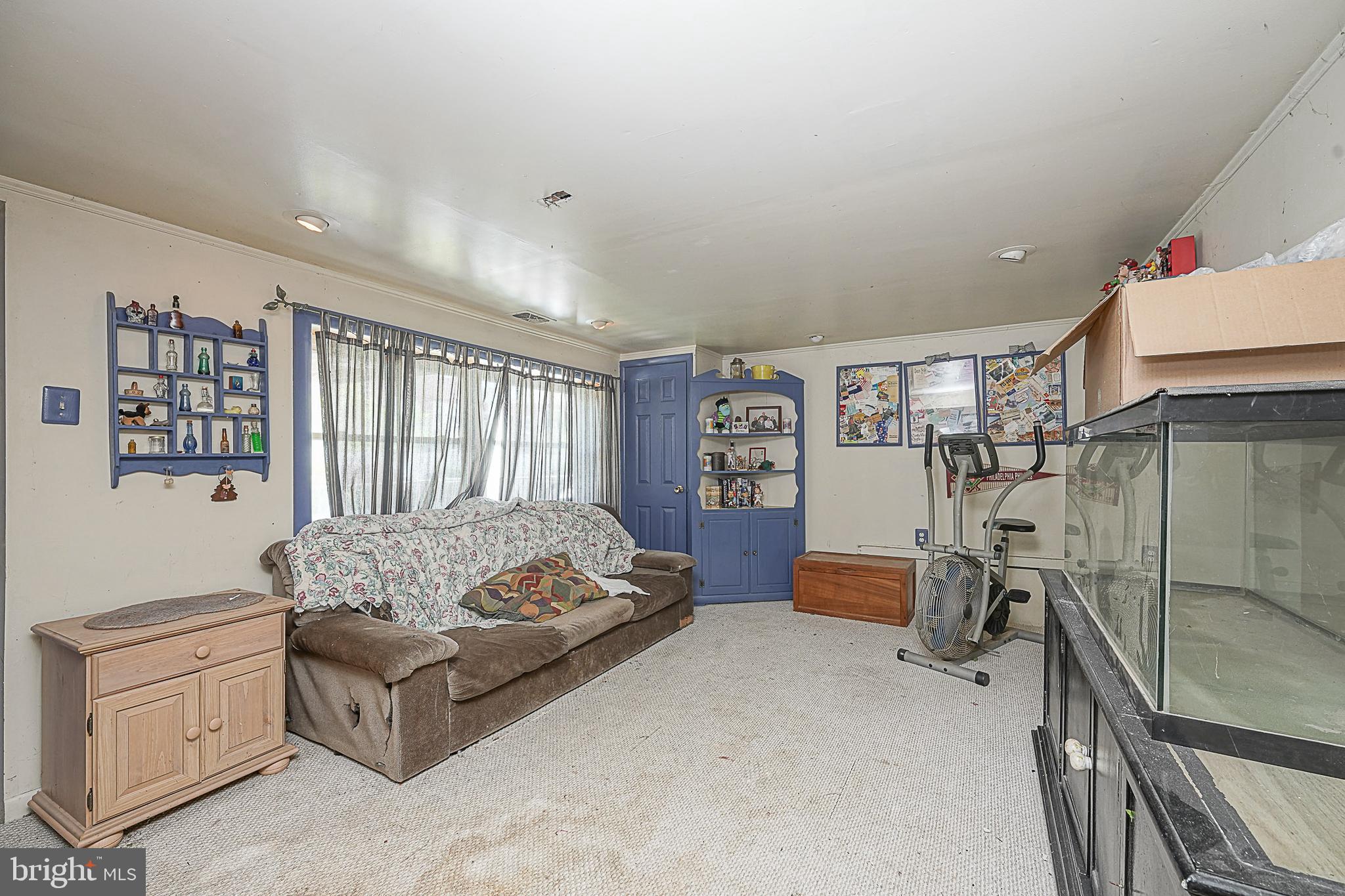 12645 Medford Road Philadelphia, PA 19154 - Photo 24 of 27 a spacious bedroom with a bed and a walk in closet
