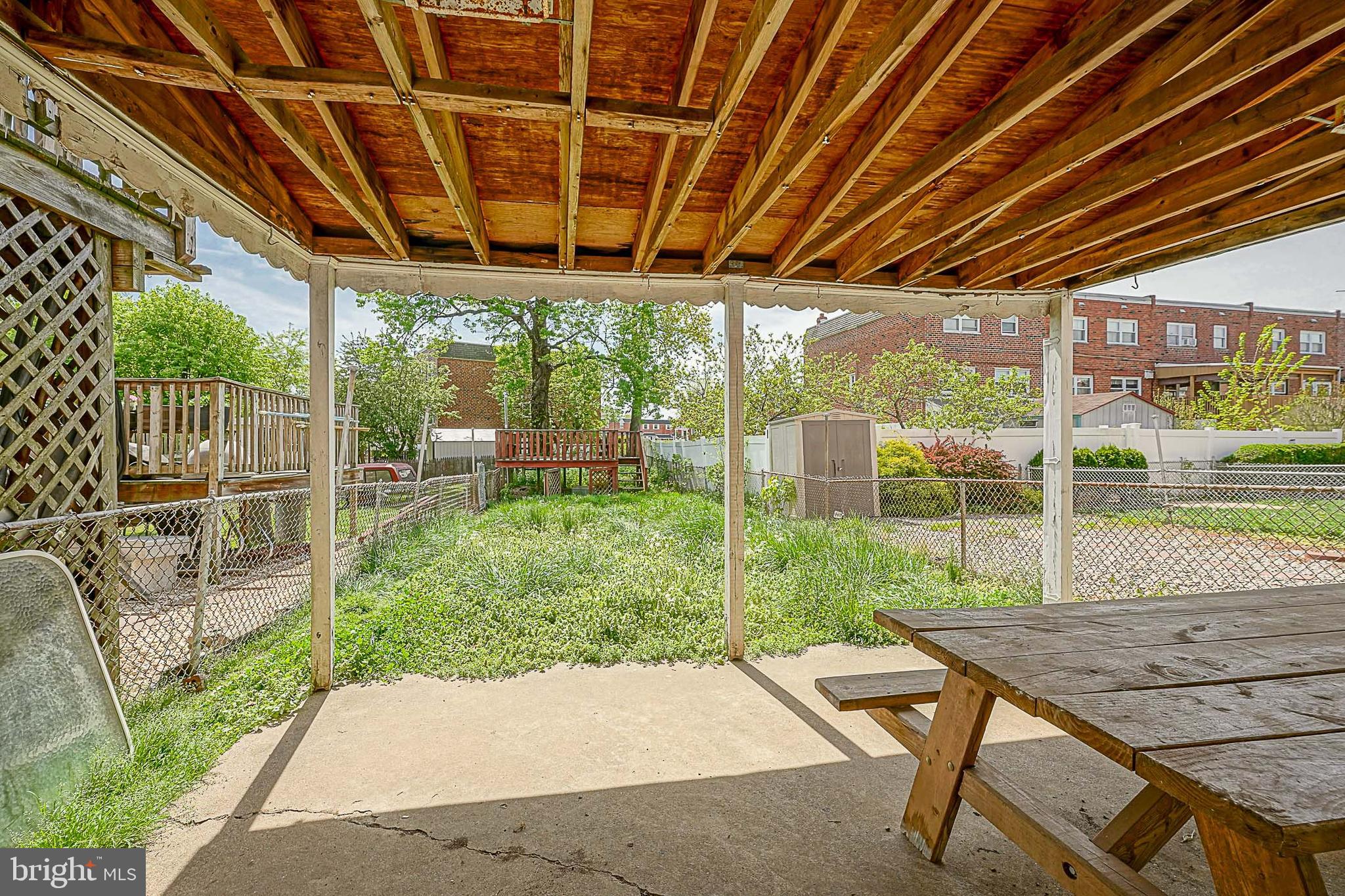 12645 Medford Road Philadelphia, PA 19154 - Photo 25 of 27 a backyard of a house with table and chairs