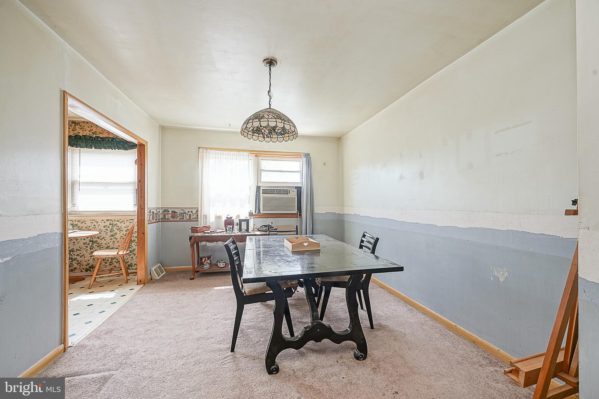 12645 Medford Road Philadelphia, PA 19154 - Photo 8 of 27 a view of a workspace with furniture and a window