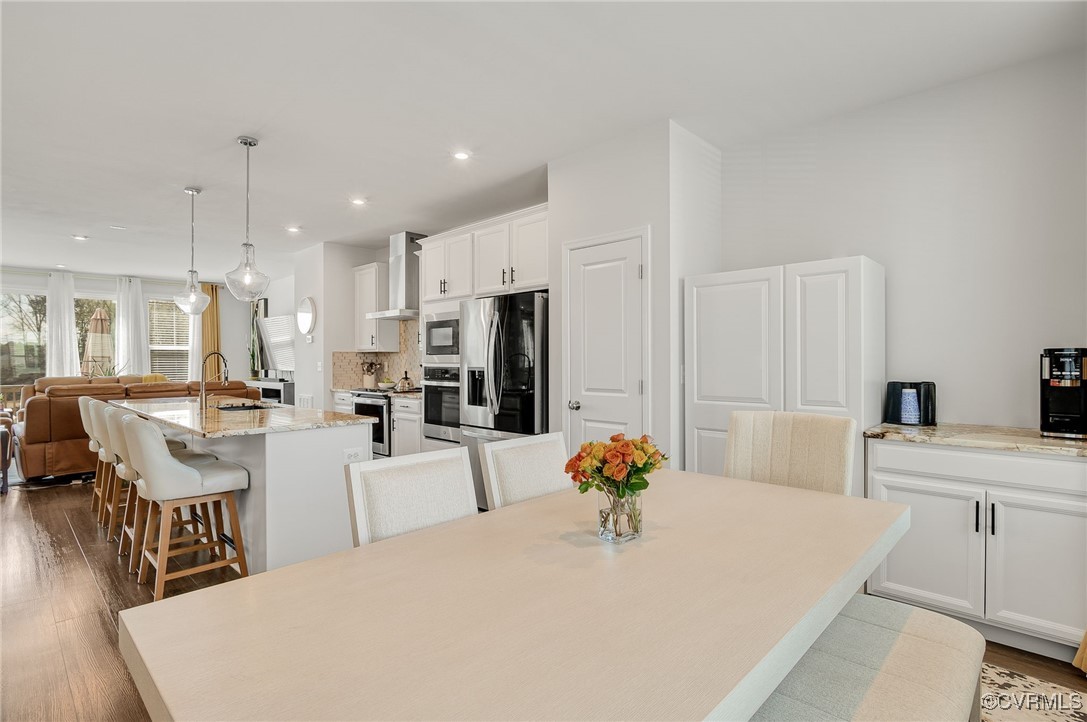 589 Rivanna Hl Road Glen Allen, VA 23060 - Photo 15 of 26 LEVEL TWO
Dining space with recessed lighting and