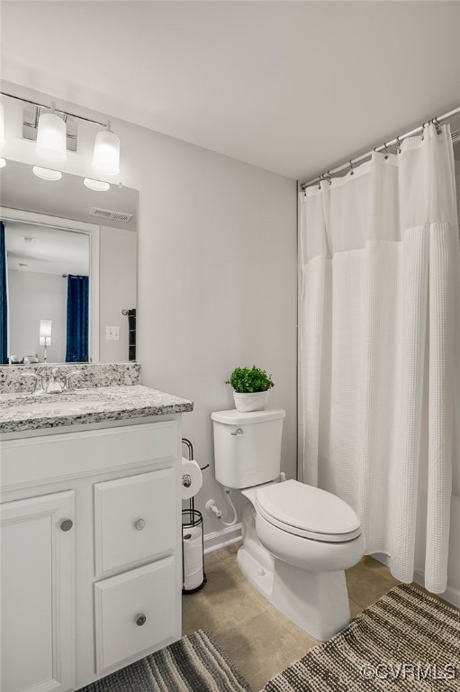 589 Rivanna Hl Road Glen Allen, VA 23060 - Photo 6 of 26 LEVEL ONE
Full bathroom featuring tile patterned