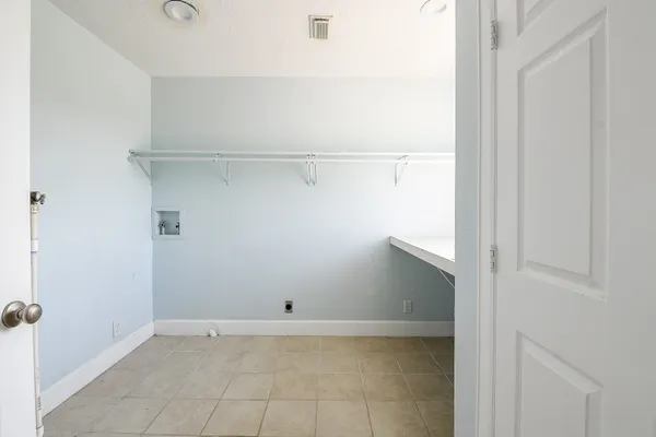 a view of an empty walk in closet