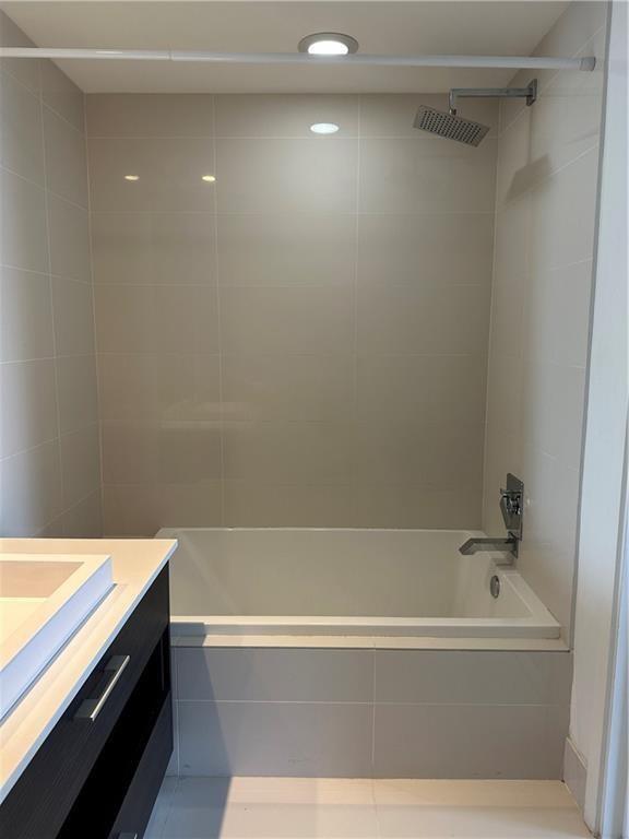 45 Southwest 9th Street, Unit 3110 Miami, FL 33130 - Photo 19 of 19 a bathroom with a bathtub and shower